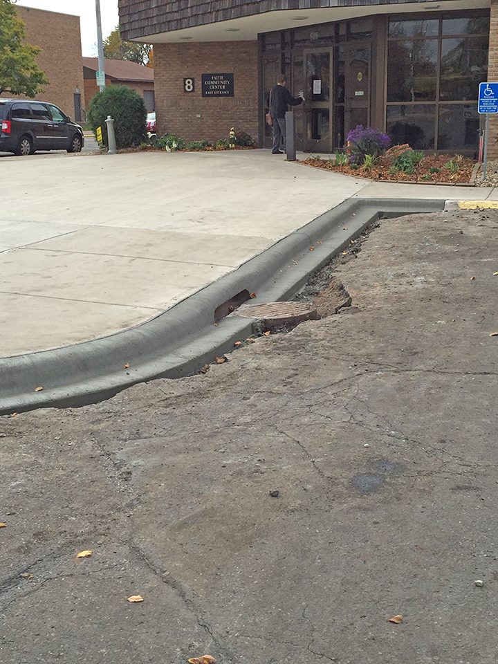 Parking lot curb line before repaving work