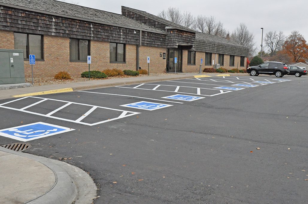 Repaved church lot with fresh parking markings