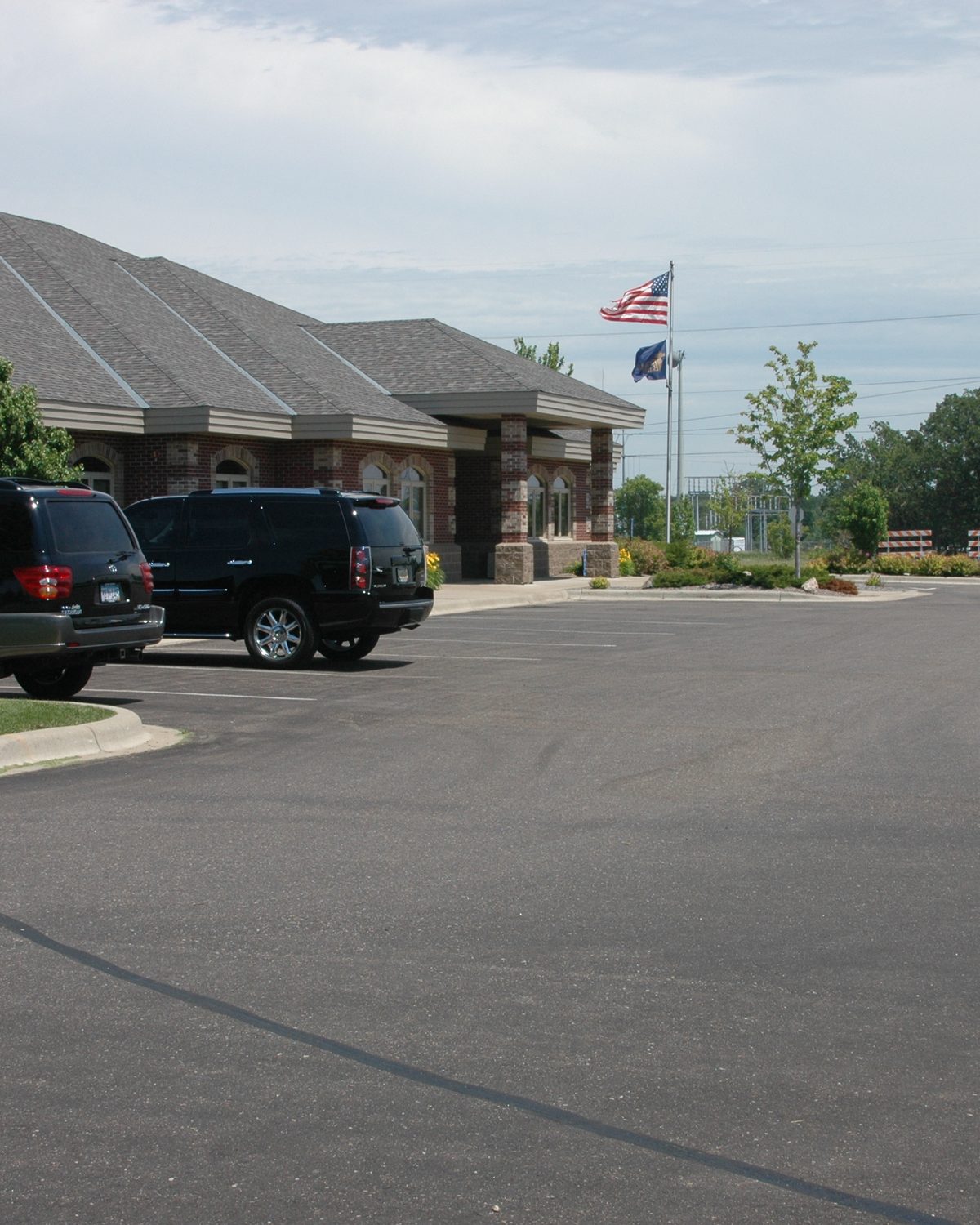 Repaired catch basin in commercial parking lot